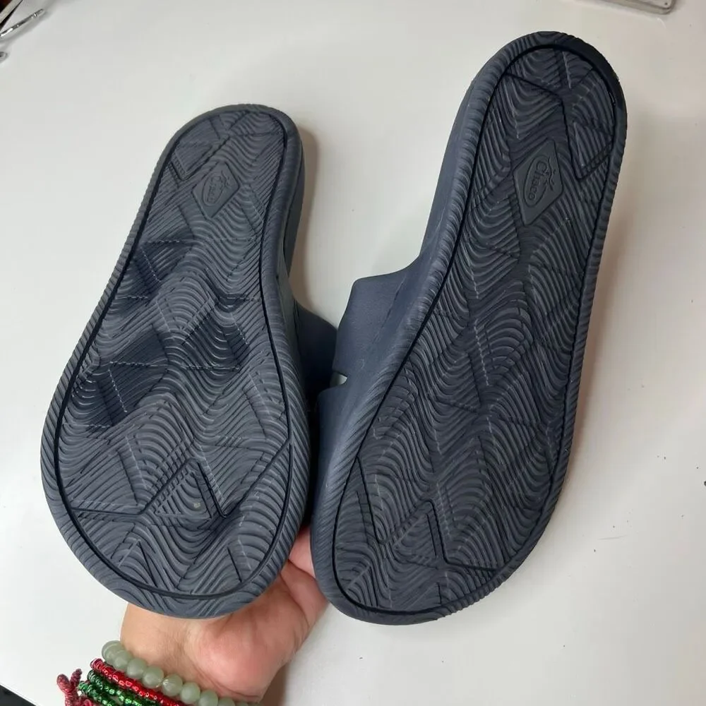 Chaco Men's Chillos slides feature blue and gray patterned adjustable straps and